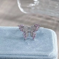 Close-up of luxury butterfly ring with pink and white cubic zirconia on blue velvet - Adjustable Open / Pink-White Mixed Butterfly Style (JZ3987A)