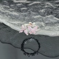 Macro view of butterfly ring with pink zircon stones and polished silver finish - Pink Butterfly Silver Ring (JZ4025)