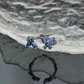 Detailed close-up of blue butterfly zircon open ring with black metal finish and pavé setting - Blue Butterfly Black Ring (JZ4030)