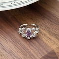 Close-up of vintage adjustable silver ring with oval purple gemstone and white zircons - Vintage Gorgeous Oval Zirconia Style(JZ3913A)