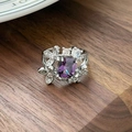 Detailed macro view of square purple zircon ring with silver floral petal setting - Square Zirconia Floral Bracket Style(JZ6096)