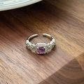 Detailed macro view of a vintage silver ring with a square purple zircon and small crystals - Square Purple Gemstone Retro Relief Style(JZ6273)