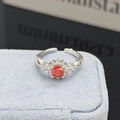 Detail of flower shaped silver ring with red gemstone on velvet jewelry box - Red Sunflower Style (JZ3015A)