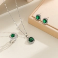 Elegant halo set jewelry with emerald green stones in necklace, ring and earrings - Silver-Emerald / Number 7