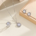 Sparkling zircon jewelry set detail including necklace, ring, and earrings on display - Silver-White / Number 6