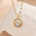 Gold evil eye necklace with colorful zircon pendant on a minimalist textured stone stand - Double Ring Evil Eye Style (TP-04463-01)