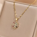 Detail of gold sunburst pendant with multicolored zircon stones on jewelry box - Sunburst Evil Eye Style (TP-04464-01)