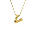 Macro detail of high-polish gold bubble letter L pendant on a fine box chain necklace - Letter V (TP-04759-01)