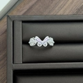 Macro detail of silver butterfly ring with purple enamel and pearl accents on black velvet - Purple Enamel Butterfly Style (JZ1216A)