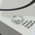 Detail of square sky blue gemstone ring with halo diamonds on a silver band - Sky Blue Square Style (JZ5679)