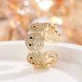 Schicker vergoldeter Ring mit Smiley-Motiv, Zirkonia-Steinen und verstellbarer Öffnung - Goldener Ring mit schwarzem Zirkon