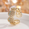 Goldener offener Ring mit Zirkonia-Smileys mit blauen Augen und verstellbarem Band - Goldener Türkis-Ring
