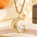 Golden crescent moon necklace with a heart-shaped crystal and elegant twisted chain - White Crystal