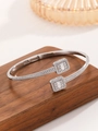 Silver-plated open cuff bracelet with sparkling zircon stones and square-shaped ends - Cuff Bracelet / Silver