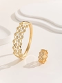 Detailed shot of hollow gold-plated bangle and ring set with intricate micro-pave crystals - Hollow Leaf Style (TT-00497-01) / Gold / Size 7