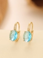 Close-up of gold hoop earrings with large oval light blue gemstones and small pavé diamonds - Oval (TE-09569-03) / Gold Aquamarine