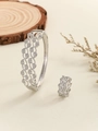 Detailed close-up of silver-tone hollowed wave pattern bangle and ring jewelry set with zircons - Hollow Leaf Style (TT-00497-04) / Silver / Size 7