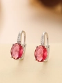 Detailed macro of oval-cut pink gemstone earrings with pave-set sparkling zircon accents - Oval (TE-09569-04) / Silver Rose Red