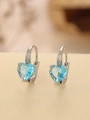 Detail of silver hoop earrings with heart-shaped light blue gemstone and small zircons - Heart (TE-09703-06)