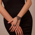 Elegant black beaded slave bracelet with geometric mesh design and integrated ring - Crown Hollow Style (998) / Black