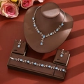 Detailed view of leaf-shaped silver necklace and earrings set with blue pear-cut zircons - Leaf Vine Style (1728) / Light Blue
