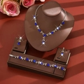 Elegant leaf-shaped silver jewelry set with blue pear-cut stones and white zircon crystals - Leaf Vine Style (1728) / Sapphire Blue