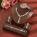 Elegant silver Y-shaped rhinestone bridal jewelry set with floral necklace and earrings - 858747 Silver Necklace Earrings Bracelet Rhinestone Set