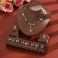 Silver leaf jewelry set with black teardrop stones and zircon on leather display - Leaf Vine Style (1728) / Black