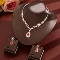 Exquisite bridal jewelry set with red teardrop gems and silver chain for weddings - Two-Piece Set / Red