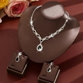 Detailed view of silver bridal jewelry set with black teardrop gems and zircon stones - Two-Piece Set / Black