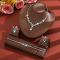 Detail of luxury jewelry set with light blue round stones and silver rhinestones - Three-Piece Set / Sky Blue