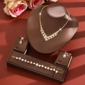 Elegant bridal jewelry set with pearl flowers and rhinestones on display stand - HB771747 Set / Gold