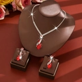 Elegant silver bridal jewelry set with red heart crystals including necklace and earrings - Two-Piece Set / Red