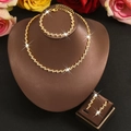 Elegant gold-plated geometric jewelry set with sparkling rhinestones on necklace and earrings - HB1329785 Set / Gold