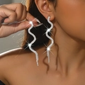 Elegant snake-shaped long drop earrings with sparkling rhinestones for a stylish look - Silver