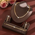 Elegant gold-tone geometric jewelry set with sparkling rhinestones for women - HB1344 Set / Gold