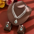 Elegant bridal jewelry set with emerald green pear-cut stones and silver necklace - Two-Piece Set / Green