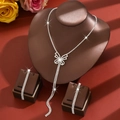 Elegant silver butterfly jewelry set with sparkling tassels and rhinestones on a warm display - Silver