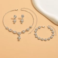 Detailed view of silver bridal jewelry set with sparkling blue and clear rhinestones - Necklace Earrings And Bracelet Combination / Silver