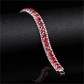 Macro view of three-row luxury bracelet featuring red square stones and white diamonds - Red