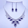 Detailed view of rhinestone wedding jewelry set with dark marquise crystals on mannequin - Black