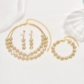 Close-up detail of golden sunflower jewelry set with sparkling rhinestones and floral patterns - Necklace Earrings Bracelet Set (484798) / Gold