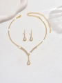 Golden bridal jewelry set with V-shaped rhinestone necklace and teardrop earrings - Necklace And Earrings / Gold