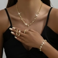 Elegant 4-piece jewelry set in gold finish with sparkling white rhinestones for weddings - Rhinestone Necklace Bracelet Ring Earrings 4-Piece Set (425747) / Gold