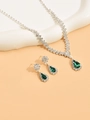 Silver bridal jewelry set featuring pear-cut green gems and rhinestone necklace with earrings - Green Necklace Earrings