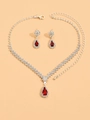 Silver jewelry set featuring a red pear-cut rhinestone necklace and matching earrings - Red Necklace Earrings