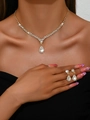 Elegant gold bridal jewelry set with V-shaped diamond necklace and pear-shaped earrings - Gold Necklace And Stud Earrings