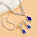 Silbernes Brautschmuck-Set mit blauen Tropfen-Kristallen und funkelnden Strasssteinen - Königsblau Halskette Ohrringe Armband