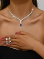 Silver-toned jewelry set featuring V-shaped diamond necklace and black pear drop earrings - Silver Black Necklace Earrings