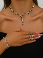 Elegant silver jewelry set with sparkling black stones and clear crystals on a model - Black Rhinestone Necklace Bracelet Earrings 3-Piece Set (483747) / Silver Black